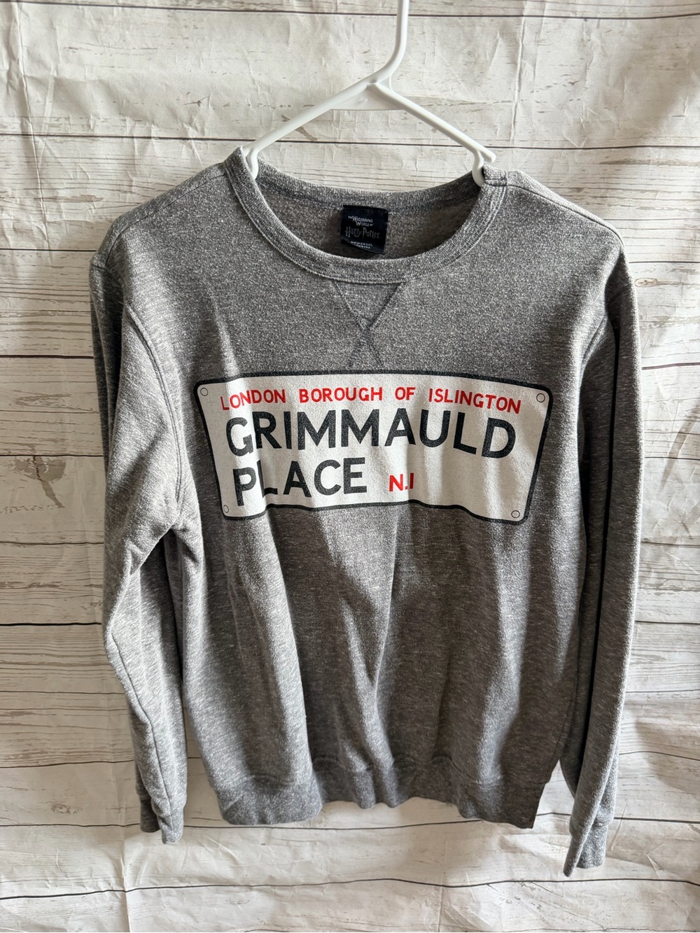 Warner Bros. Gray Grimmauld Place Crewneck Sweatshirt with Red Accent